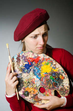 Funny artist working in the studioの写真素材
