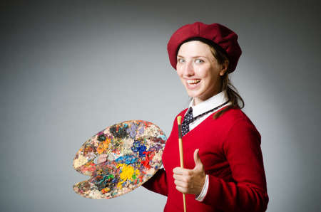 Funny artist working in the studioの写真素材