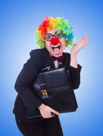 Woman clown businesswoman isolated on whiteの写真素材