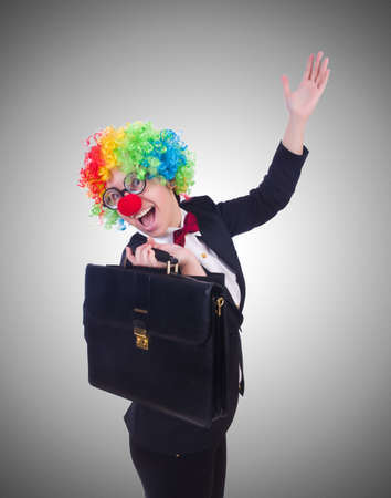 Woman clown businesswoman isolated on whiteの写真素材