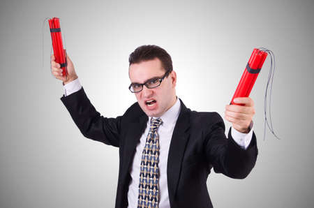 Businessman with dynamite isolated on white