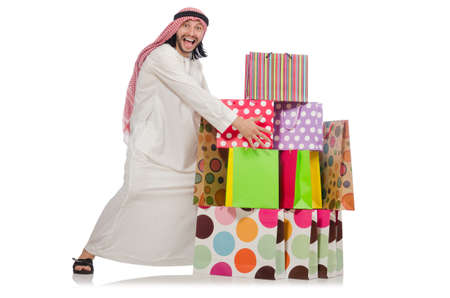 Arab man with shopping bagsの写真素材