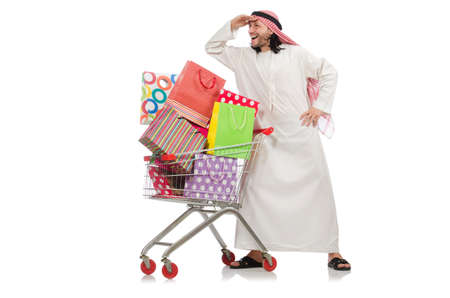 Arab man doing shopping isolated on whiteの写真素材