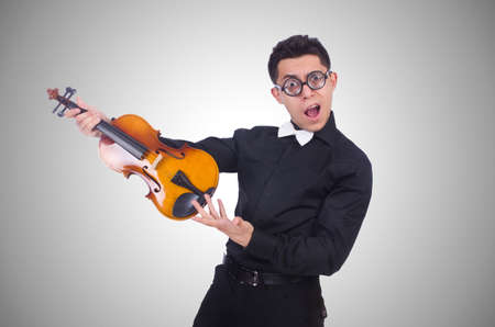 Funny violin player on whiteの写真素材