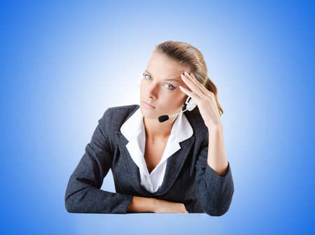 Female helpdesk operator on whiteの写真素材