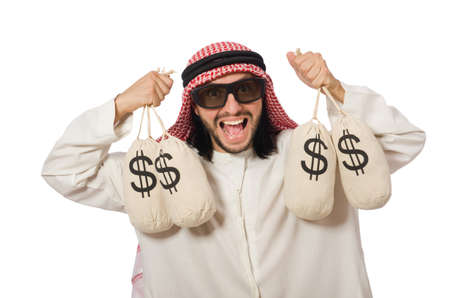 Arab businessman with sacks of moneyの写真素材