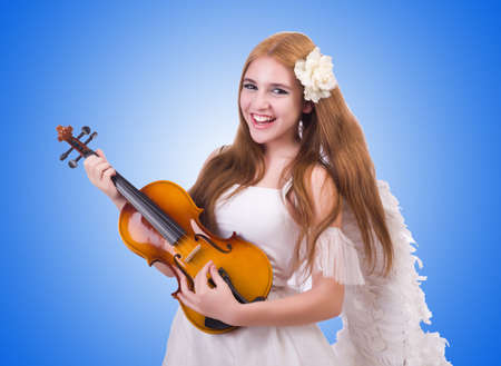 Young violin player isolated on whiteの写真素材