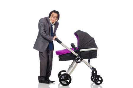 Funny dad with baby and pram on whiteの写真素材