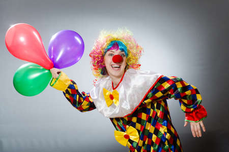 Clown with balloons in funny conceptの写真素材