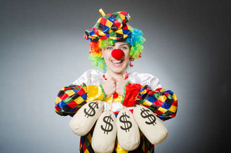Funny clown in comical concept