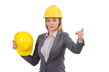 Businesswoman in gray suit and safety helmet isolated on whiteの写真素材