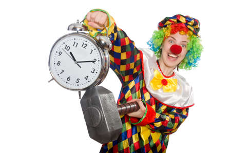 Clown with clock and hammer isolated on whiteの写真素材