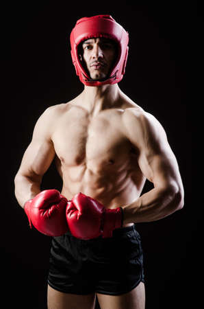 Muscular man in boxing conceptの写真素材