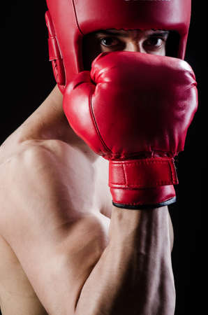 Muscular man in boxing conceptの写真素材