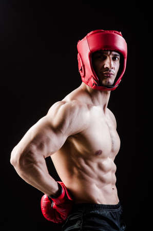 Muscular man in boxing conceptの写真素材