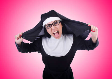 Funny nun isolated on the whiteの写真素材