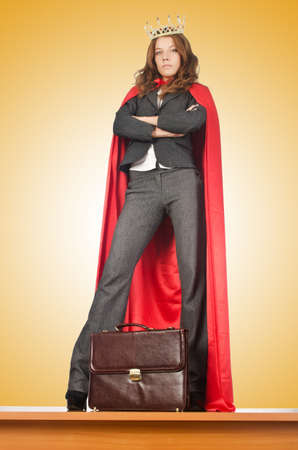 Queen businessman standing on the deskの写真素材