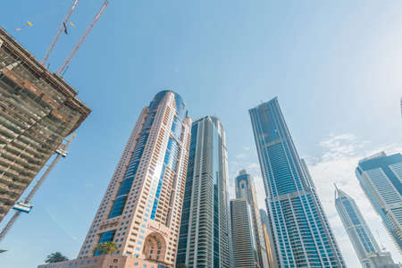 Dubai - AUGUST 9, 2014: Dubai Marina district on August 9 in UAE. Dubai is fastly developing city in...
