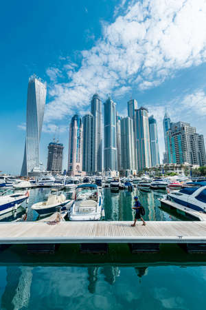 Dubai - AUGUST 9, 2014: Dubai Marina district on August 9 in UAE. Dubai is fastly developing city in Middle Eastのeditorial素材