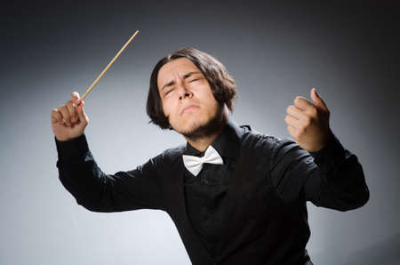 Funny conductor in musical conceptの写真素材