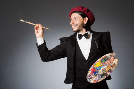 Funny artist working in the studioの写真素材