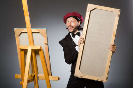 Funny artist working in the studioの写真素材