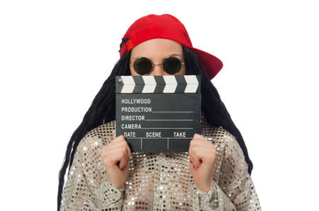 Girl with dreadlocks holding clapperboard isolated on whiteの写真素材