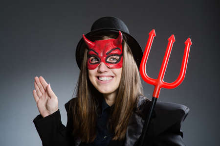 Funny devil in halloween concept