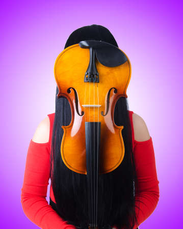 Young girl with violin on whiteの写真素材