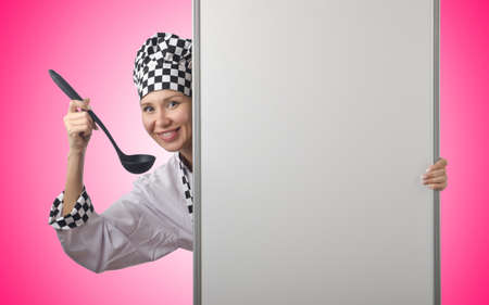 Cook with ladle and blank boardの写真素材