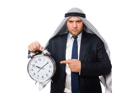 Arab man with clock isolated on whiteの写真素材