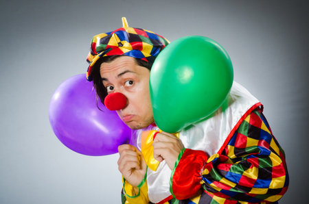 Funny clown in comical conceptの写真素材