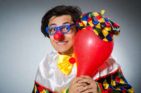 Funny clown in comical conceptの写真素材