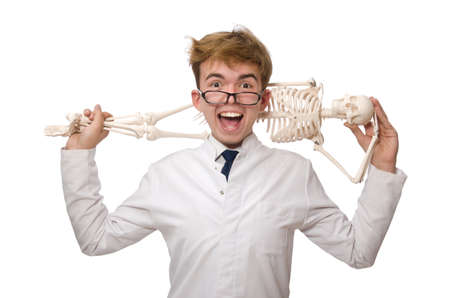 Funny doctor with skeleton isolated on whiteの写真素材
