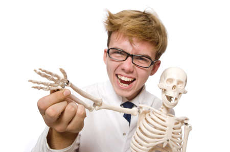 Funny doctor with skeleton isolated on whiteの写真素材