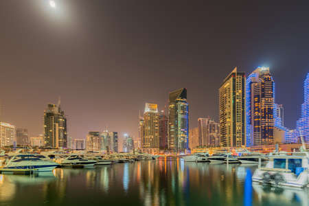 Dubai - JANUARY 10, 2015: Marina district on January 10 in UAE, Dubai. Marina district is popular residential area in Dubaiのeditorial素材