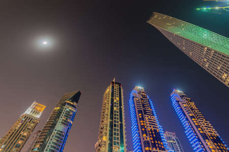 Dubai - JANUARY 10, 2015: Marina district on January 10 in UAE, Dubai. Marina district is popular residential area in Dubaiのeditorial素材