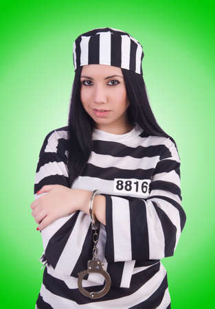 Prisoner in striped uniform on whiteの写真素材
