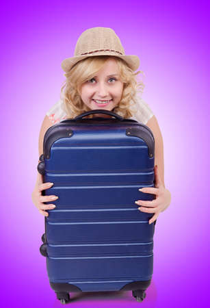 Young woman preparing for vacationの写真素材