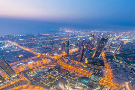 Panorama of night Dubai during sunset