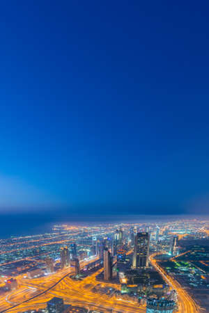 Panorama of night Dubai during sunsetの写真素材