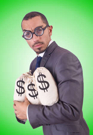 Man with money sacks on whiteの写真素材