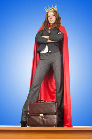 Queen businessman standing on the deskの写真素材