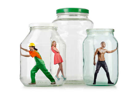 People trapped in the glass jarの写真素材