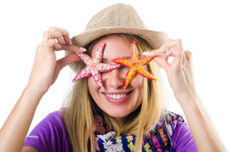 Woman with star shells isolated on whiteの写真素材