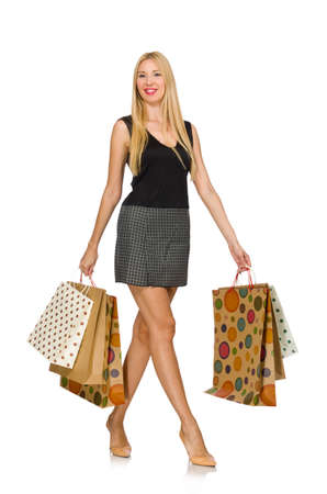 Woman with shopping bags isolated on whiteの写真素材