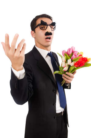 Funny man with flowers isolated on whiteの写真素材