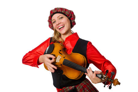 Funny woman in scottish clothing with violinの写真素材