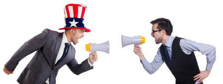 Two businessmen with loudspeakers isolated on whiteの写真素材