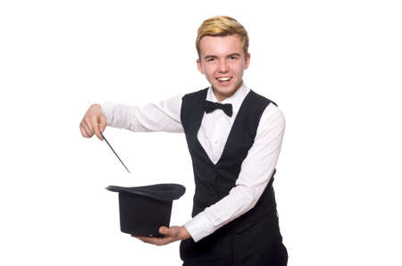 Magician with magic stick isolated on whiteの写真素材
